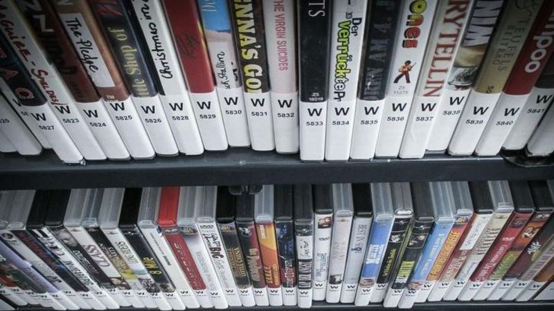 Shelves Stacked with DVDs